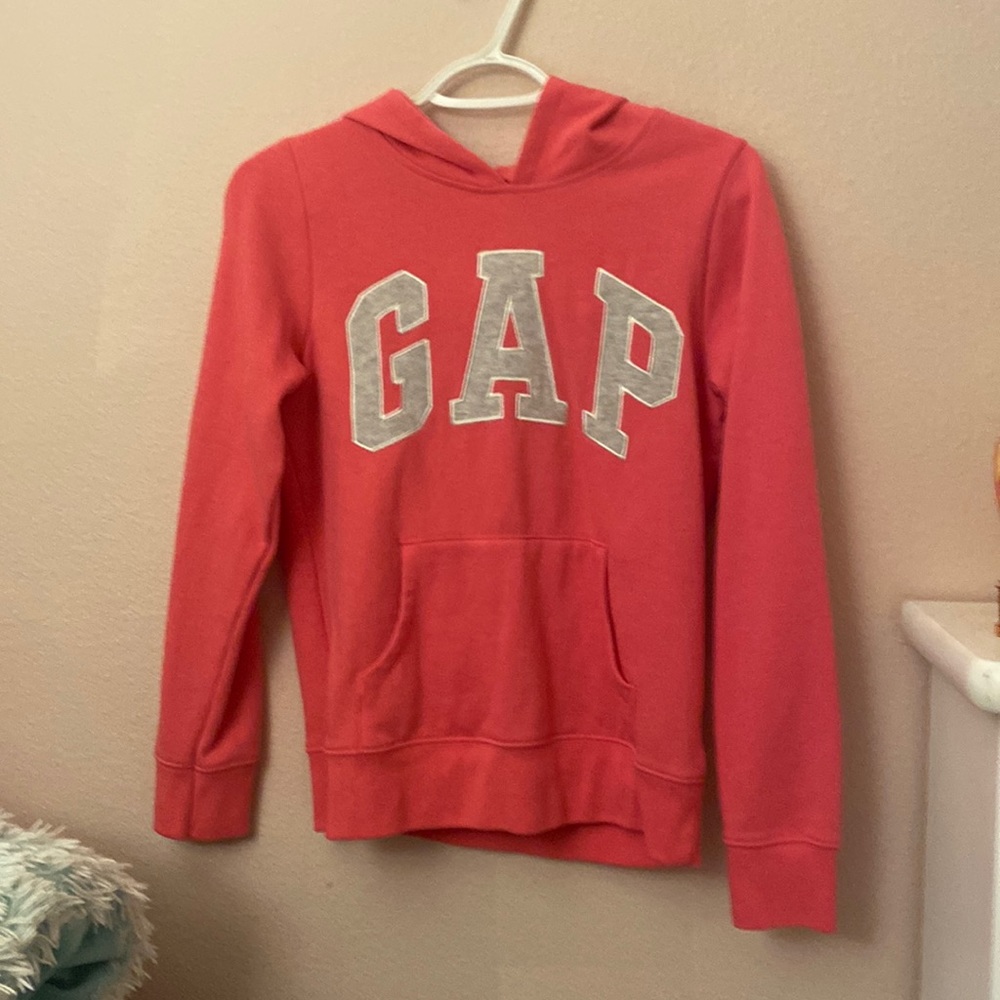 This sweater was a gift, it was never worn. It was from GAP. The size is (14-16)